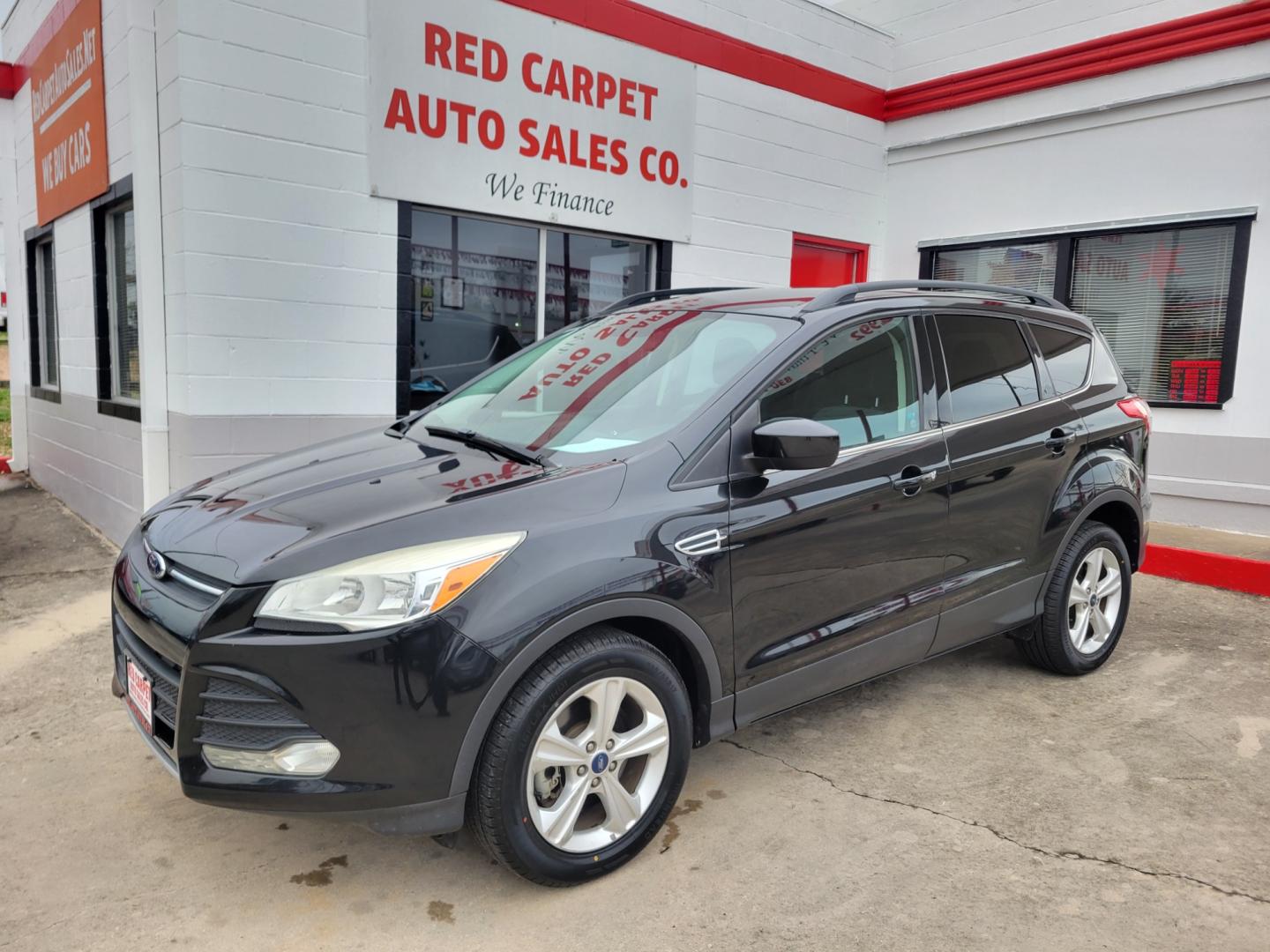 2014 BLACK Ford Escape SE FWD (1FMCU0G97EU) with an 2.0L L4 DOHC 16V engine, 6-Speed Automatic transmission, located at 503 West Court, Seguin, TX, 78155, (830) 379-3373, 29.568621, -97.969803 - Photo#0